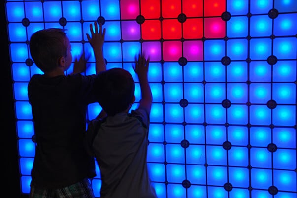 Kids playing with lighted cubes